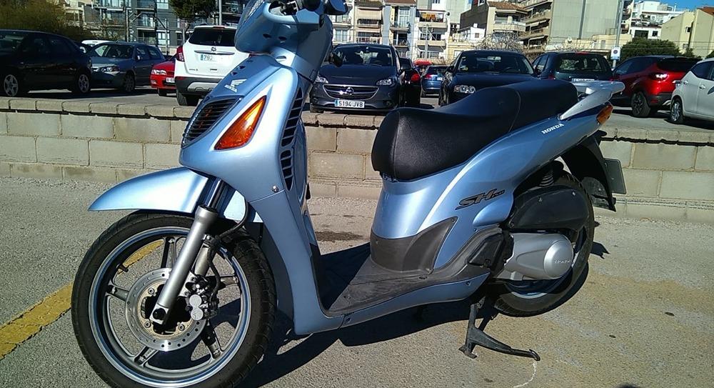 Moto HONDA PASSION 150I de segunda mano del año 2002 en Barcelona